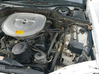 ✅ 1989 Mercedes-Benz 420 SEL • VIN: WDBCA35E4KA456613 • Лот: 41145650. Опубликован ранее на IAAI с пробегом 199 599 миль. Бесплатный доступ к архиву аукционных продаж из США и подробный отчёт об истории автомобиля на DreamBid. Изображение 19.