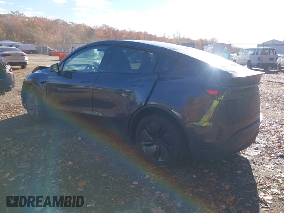 ✅ 2026 Tesla Model Y Long Range Launch Series • VIN: 7SAYGDEE1TA386881 • Lot: 43618333. Listed on IAAI with 8,882 mi. Free auction sales archive from the USA and detailed vehicle history report at DreamBid. Image 3.