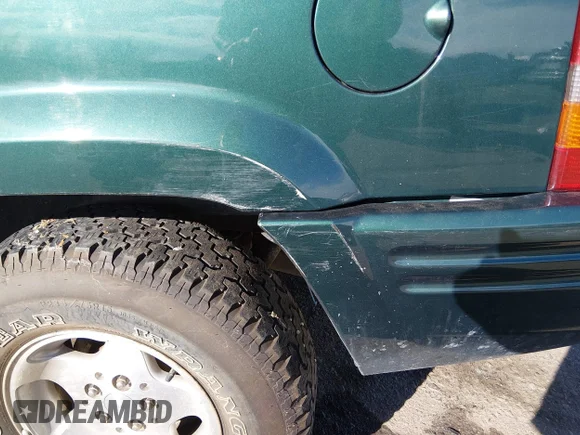 ✅ 1998 Jeep Grand Cherokee Laredo • VIN: 1J4GZ48Y0WC282342 • Lot: 44340184. Wystawiony na IAAI z przebiegiem 160 976 mil. Bezpłatny archiwum sprzedaży aukcyjnych z USA i szczegółowy raport historii pojazdu na DreamBid. Zdjęcie 6.