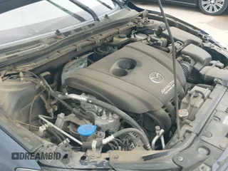 ✅ 2016 Mazda 3 i Grand Touring • VIN: 3MZBM1X72GM237888 • Лот: 41937237. Опубликован ранее на IAAI с пробегом 93 454 миль. Бесплатный доступ к архиву аукционных продаж из США и подробный отчёт об истории автомобиля на DreamBid. Изображение 19.