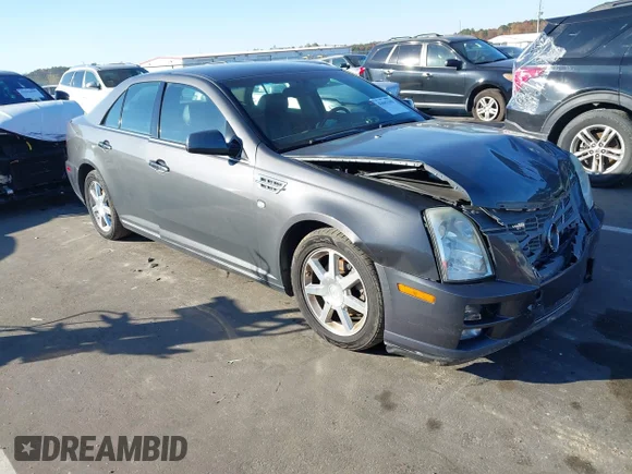 ✅ 2008 Cadillac STS RWD • VIN: 1G6DC67A980203400 • Lot: 43643365. Listed on IAAI with 182,689 mi. Free auction sales archive from the USA and detailed vehicle history report at DreamBid. Image 1.