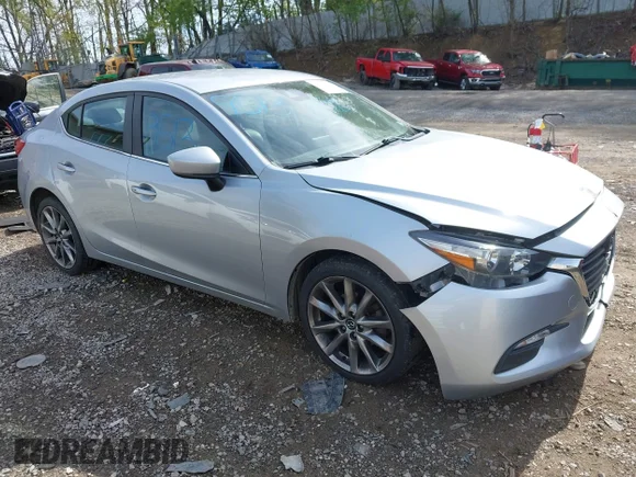 ✅ 2018 Mazda 3 Touring • VIN: 3MZBN1V32JM165384 • Lot: 45119513. Listed on IAAI with 147,794 mi. Free auction sales archive from the USA and detailed vehicle history report at DreamBid. Image 1.
