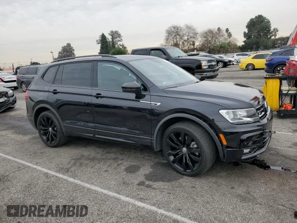 ✅ 2021 Volkswagen Tiguan SE • VIN: 3VV2B7AX6MM122941 • Lot: 72601892. Listed on Copart with 10,714 mi. Free auction sales archive from the USA and detailed vehicle history report at DreamBid. Image 4.