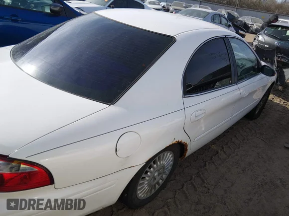 ✅ 2004 Mercury Sable GS • VIN: 1MEFM50U44G608727 • Лот: 44212756. Опубліковано раніше на IAAI з пробігом 249 171 миль. Безкоштовний доступ до архіву аукціонних продажів зі США та докладний звіт про історію автомобіля на DreamBid. Зображення 4.