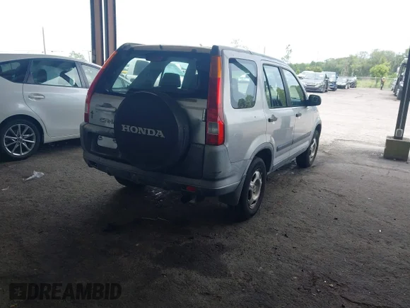 ✅ 2004 Honda CR-V LX • VIN: JHLRD68444C013962 • Lot: 45409571. Listed on IAAI with 208,597 mi. Free auction sales archive from the USA and detailed vehicle history report at DreamBid. Image 4.