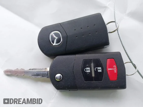 ✅ 2009 Mazda 5 Sport • VIN: JM1CR29L890356690 • Lot: 41169351. Listed on IAAI with 118,582 mi. Free auction sales archive from the USA and detailed vehicle history report at DreamBid. Image 11.