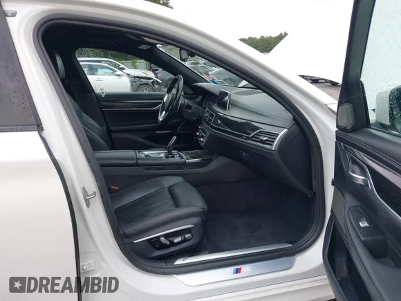✅ 2017 BMW 7 Series 740e xDrive • VIN: WBA7J2C30HG497919 • Lot: 42717924. Listed on IAAI with 123,946 mi. Free auction sales archive from the USA and detailed vehicle history report at DreamBid. Image 5.