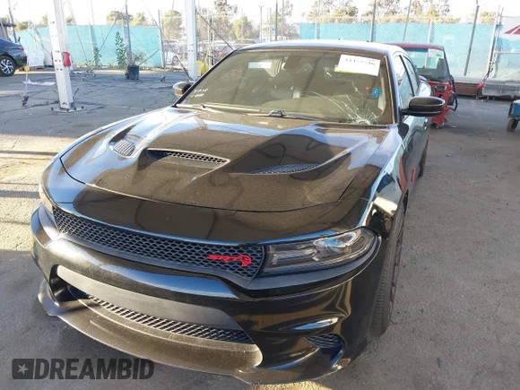 ✅ 2016 Dodge Charger SRT Hellcat • VIN: 2C3CDXL92GH165045 • Лот: 44452546. Опубліковано раніше на IAAI з пробігом 70 381 миль. Безкоштовний доступ до архіву аукціонних продажів зі США та докладний звіт про історію автомобіля на DreamBid. Зображення 6.