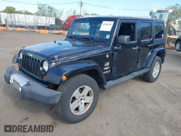 ✅ 2012 Jeep Wrangler Unlimited Sahara • VIN: 1C4BJWEG8CL100879 • Lot: 44926204. Listed on IAAI with 196,960 mi. Free auction sales archive from the USA and detailed vehicle history report at DreamBid. Image 2.