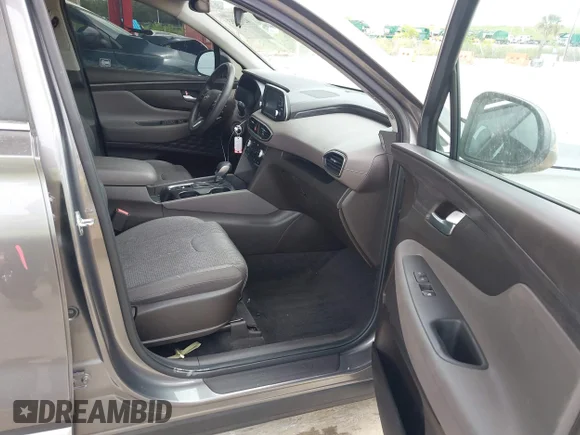 ✅ 2020 Hyundai Santa Fe SE • VIN: 5NMS23AD8LH163487 • Лот: 42929883. Опубліковано раніше на IAAI з пробігом 77 636 миль. Безкоштовний доступ до архіву аукціонних продажів зі США та докладний звіт про історію автомобіля на DreamBid. Зображення 5.