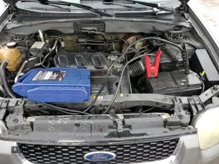 ✅ 2003 Ford Escape Limited • VIN: 1FMCU941X3KD47977 • Lot: 85054974. Listed on Copart with 303,773 mi. Free auction sales archive from the USA and detailed vehicle history report at DreamBid. Image 14.