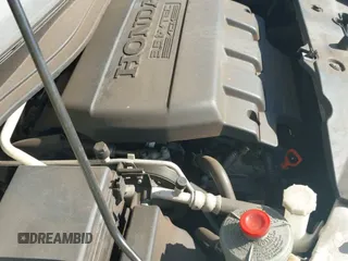 ✅ 2014 Honda Odyssey EX-L • VIN: 5FNRL5H67EB083570 • Лот: 43304088. Опубликован ранее на IAAI с пробегом 164 085 миль. Бесплатный доступ к архиву аукционных продаж из США и подробный отчёт об истории автомобиля на DreamBid. Изображение 19.