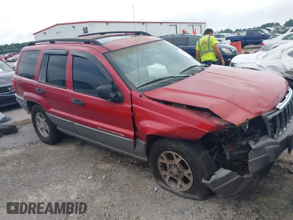 ✅ 2002 Jeep Grand Cherokee • VIN: 1J4GX38S52C154359 • Lot: 42765362. Listed on IAAI with 333,596 mi. Free auction sales archive from the USA and detailed vehicle history report at DreamBid. Image 1.
