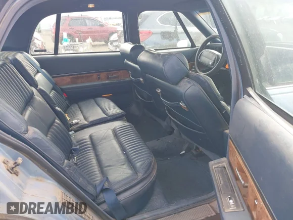 ✅ 1991 Buick Park Avenue • VIN: 1G4CW53L2M1685399 • Lot: 43323037. Wystawiony na IAAI z przebiegiem 180 495 mil. Bezpłatny archiwum sprzedaży aukcyjnych z USA i szczegółowy raport historii pojazdu na DreamBid. Zdjęcie 8.