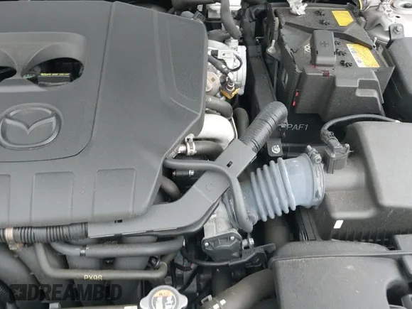 ✅ 2023 Mazda 3 S Preferred • VIN: JM1BPALM5P1610554 • Лот: 43772695. Опубліковано раніше на IAAI з пробігом 43 220 миль. Безкоштовний доступ до архіву аукціонних продажів зі США та докладний звіт про історію автомобіля на DreamBid. Зображення 19.