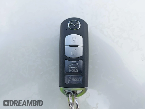 ✅ 2017 Mazda CX-5 Grand Touring • VIN: JM3KFBDL4H0186345 • Lot: 42244493. Wystawiony na IAAI z przebiegiem 58 063 mil. Bezpłatny archiwum sprzedaży aukcyjnych z USA i szczegółowy raport historii pojazdu na DreamBid. Zdjęcie 11.
