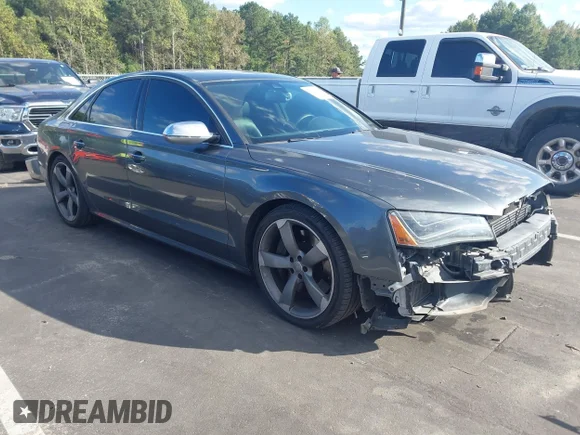 ✅ 2014 Audi S8 • VIN: WAUD2AFD9EN004471 • Lot: 43376831. Listed on IAAI with 97,681 mi. Free auction sales archive from the USA and detailed vehicle history report at DreamBid. Image 1.
