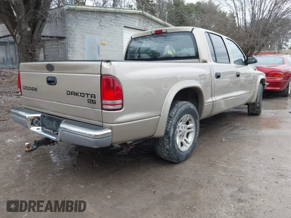 ✅ 2003 Dodge Dakota SLT • VIN: 1D7HL48NX3S236543 • Lot: 44160895. Wystawiony na IAAI z przebiegiem 265 801 mil. Bezpłatny archiwum sprzedaży aukcyjnych z USA i szczegółowy raport historii pojazdu na DreamBid. Zdjęcie 4.