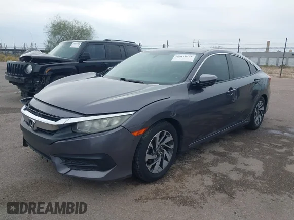 ✅ 2018 Honda Civic EX • VIN: 2HGFC2F70JH581211 • Lot: 44039628. Wystawiony na IAAI z przebiegiem Nie podano. Bezpłatny archiwum sprzedaży aukcyjnych z USA i szczegółowy raport historii pojazdu na DreamBid. Zdjęcie 2.