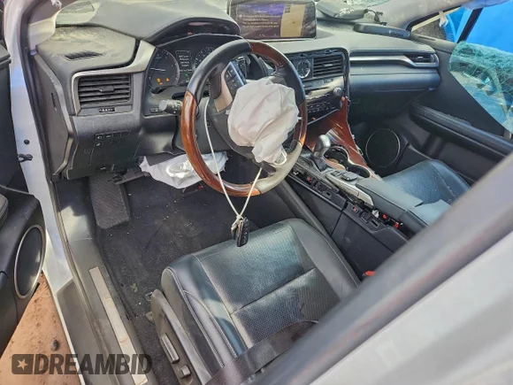 ✅ 2018 Lexus RX 350L Premium • VIN: JTJDZKCA5J2008606 • Лот: 90124405. Опубліковано раніше на Copart з пробігом 60 223 миль. Безкоштовний доступ до архіву аукціонних продажів зі США та докладний звіт про історію автомобіля на DreamBid. Зображення 8.