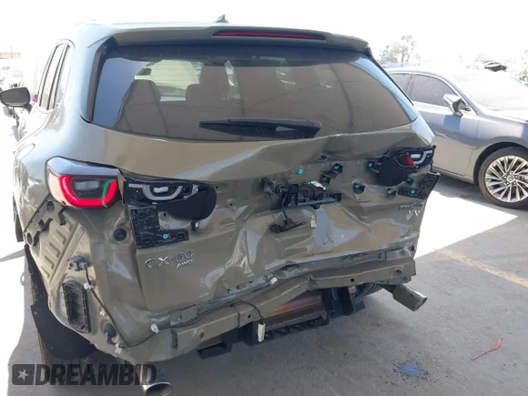 ✅ 2023 Mazda CX-50 Premium • VIN: 7MMVABDY2PN104940 • Lot: 45189213. Listed on IAAI with 33,916 mi. Free auction sales archive from the USA and detailed vehicle history report at DreamBid. Image 6.