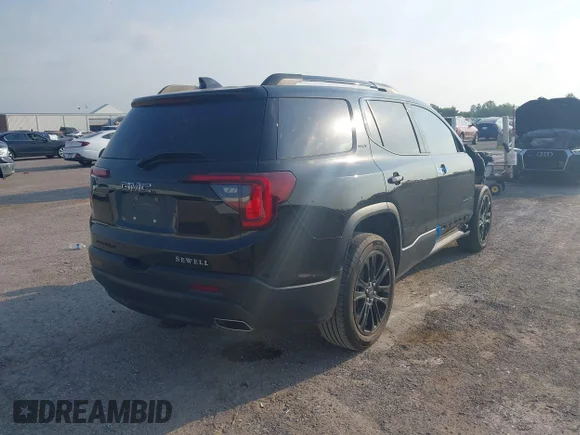 ✅ 2023 GMC Acadia SLT • VIN: 1GKKNMLS8PZ253608 • Lot: 42264701. Listed on IAAI with 25,469 mi. Free auction sales archive from the USA and detailed vehicle history report at DreamBid. Image 4.