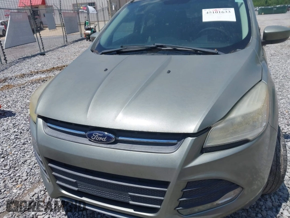 ✅ 2013 Ford Escape SE • VIN: 1FMCU0GXXDUD15323 • Lot: 45101633. Wystawiony na IAAI z przebiegiem 109 028 mil. Bezpłatny archiwum sprzedaży aukcyjnych z USA i szczegółowy raport historii pojazdu na DreamBid. Zdjęcie 6.