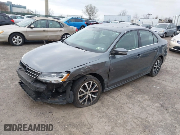 ✅ 2017 Volkswagen Jetta SE • VIN: 3VWDB7AJ0HM404417 • Lot: 43909744. Wystawiony na IAAI z przebiegiem 71 690 mil. Bezpłatny archiwum sprzedaży aukcyjnych z USA i szczegółowy raport historii pojazdu na DreamBid. Zdjęcie 2.