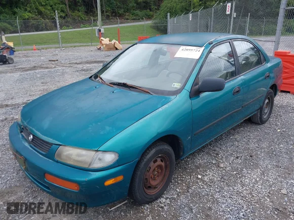 ✅ 1995 Mazda Protege • VIN: JM1BA1415S0181226 • Лот: 42895724. Опубліковано раніше на IAAI з пробігом 163 258 миль. Безкоштовний доступ до архіву аукціонних продажів зі США та докладний звіт про історію автомобіля на DreamBid. Зображення 2.