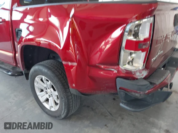 ✅ 2021 Chevrolet Colorado 2WD LT • VIN: 1GCGSCEN9M1141583 • Lot: 42983863. Listed on IAAI with 151,495 mi. Free auction sales archive from the USA and detailed vehicle history report at DreamBid. Image 6.