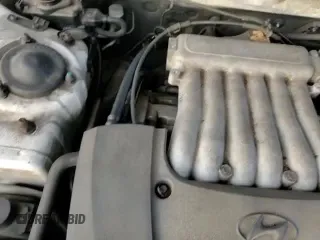 2004 Hyundai Sonata GLS z VIN KMHWF35H84A957433, wystawiony jako Copart lot #82852774 z przebiegiem 187 857 mil mil oraz Szkoda całkowita • Salvage title. Historia ofert i sprzedaży dostępna na DreamBid. Obrazek 15.