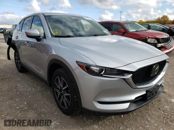 ✅ 2018 Mazda CX-5 Touring • VIN: JM3KFBCM3J0361815 • Lot: 63784232. Wystawiony na Copart z przebiegiem 59 355 mil. Bezpłatny archiwum sprzedaży aukcyjnych z USA i szczegółowy raport historii pojazdu na DreamBid. Zdjęcie 1.