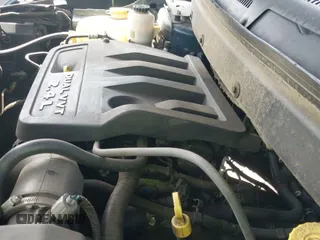 2015 Dodge Journey American Value z VIN 3C4PDCABXFT610861, wystawiony jako IAAI lot #43068421 z przebiegiem 153 937 mil mil oraz . Historia ofert i sprzedaży dostępna na DreamBid. Obrazek 19.