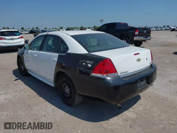 ✅ 2014 Chevrolet Impala Police Police • VIN: 2G1WD5E33E1161171 • Lot: 43141946. Wystawiony na IAAI z przebiegiem 132 854 mil. Bezpłatny archiwum sprzedaży aukcyjnych z USA i szczegółowy raport historii pojazdu na DreamBid. Zdjęcie 3.