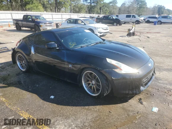 ✅ 2012 Nissan 370Z • VIN: JN1AZ4EH6CM562968 • Lot: 46462325. Wystawiony na Copart z przebiegiem 134 753 mil. Bezpłatny archiwum sprzedaży aukcyjnych z USA i szczegółowy raport historii pojazdu na DreamBid. Zdjęcie 4.