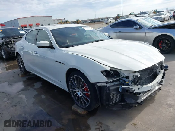 ✅ 2021 Maserati Ghibli S GranLusso • VIN: ZAM57YSL1M1362065 • Lot: 44049039. Listed on IAAI with 24,999 mi. Free auction sales archive from the USA and detailed vehicle history report at DreamBid. Image 1.