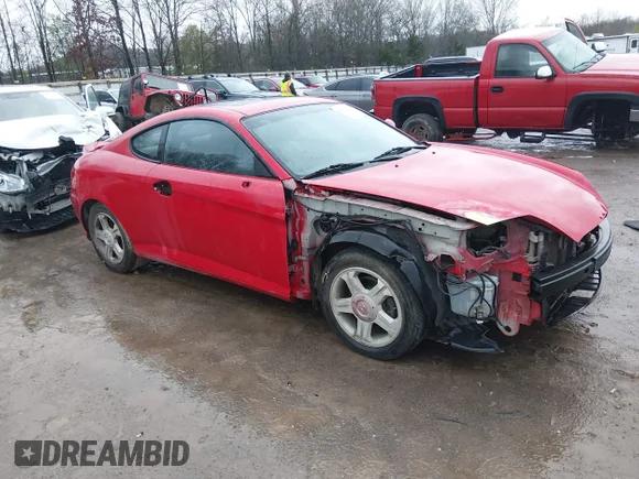 ✅ 2003 Hyundai Tiburon GT • VIN: KMHHN65F93U092142 • Lot: 44604110. Listed on IAAI with 90,413 mi. Free auction sales archive from the USA and detailed vehicle history report at DreamBid. Image 1.
