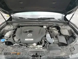 ✅ 2023 Mazda CX-50 Premium • VIN: 7MMVABDY6PN134930 • Лот: 65775675. Опубликован ранее на Copart с пробегом 30 429 миль. Бесплатный доступ к архиву аукционных продаж из США и подробный отчёт об истории автомобиля на DreamBid. Изображение 14.