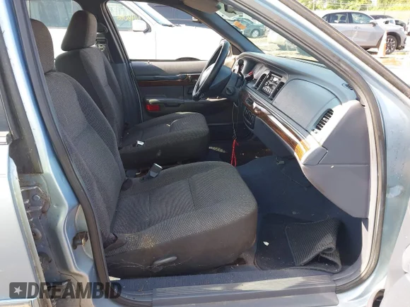 ✅ 1999 Mercury Grand Marquis • VIN: 2NEFM74W1XX665604 • Lot: 45131377. Wystawiony na IAAI z przebiegiem 147 965 mil. Bezpłatny archiwum sprzedaży aukcyjnych z USA i szczegółowy raport historii pojazdu na DreamBid. Zdjęcie 5.