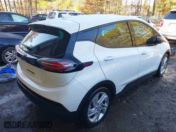 ✅ 2023 Chevrolet Bolt EV 1LT • VIN: 1G1FW6S02P4106941 • Лот: 43822818. Опубликован ранее на IAAI с пробегом 35 542 миль. Бесплатный доступ к архиву аукционных продаж из США и подробный отчёт об истории автомобиля на DreamBid. Изображение 4.