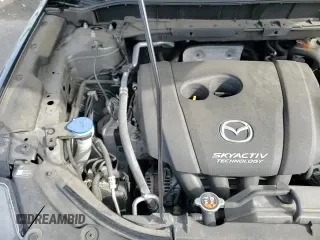 ✅ 2017 Mazda CX-5 Grand Touring • VIN: JM3KFBDL9H0220781 • Lot: 92483545. Wystawiony na Copart z przebiegiem 87 656 mil. Bezpłatny archiwum sprzedaży aukcyjnych z USA i szczegółowy raport historii pojazdu na DreamBid. Zdjęcie 15.