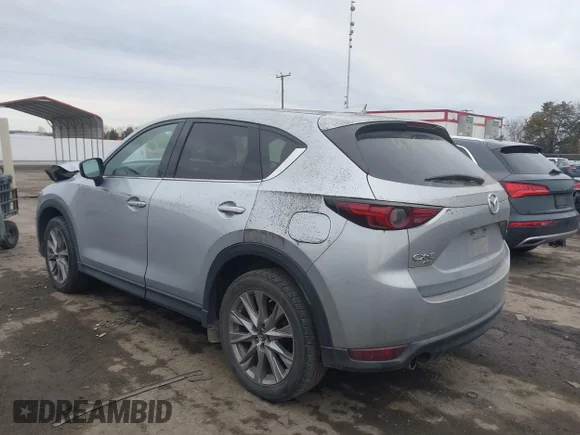 ✅ 2020 Mazda CX-5 Grand Touring • VIN: JM3KFBDM7L1729439 • Lot: 43956976. Wystawiony na IAAI z przebiegiem 106 036 mil. Bezpłatny archiwum sprzedaży aukcyjnych z USA i szczegółowy raport historii pojazdu na DreamBid. Zdjęcie 3.