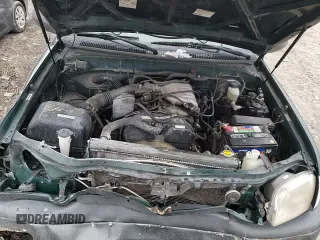 ✅ 2000 Toyota Tundra • VIN: 5TBJN3210YS094489 • Lot: 86203894. Listed on Copart with 273,789 mi. Free auction sales archive from the USA and detailed vehicle history report at DreamBid. Image 13.