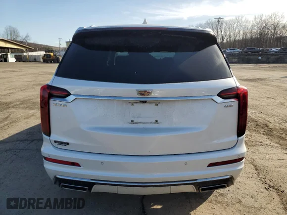 ✅ 2022 Cadillac XT6 Premium Luxury • VIN: 1GYKPDRS9NZ113152 • Лот: 49411355. Опубликован ранее на Copart с пробегом 32 948 миль. Бесплатный доступ к архиву аукционных продаж из США и подробный отчёт об истории автомобиля на DreamBid. Изображение 6.