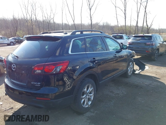 ✅ 2015 Mazda CX-9 Touring • VIN: JM3TB3CV6F0464295 • Lot: 44784370. Wystawiony na IAAI z przebiegiem 113 652 mil. Bezpłatny archiwum sprzedaży aukcyjnych z USA i szczegółowy raport historii pojazdu na DreamBid. Zdjęcie 4.