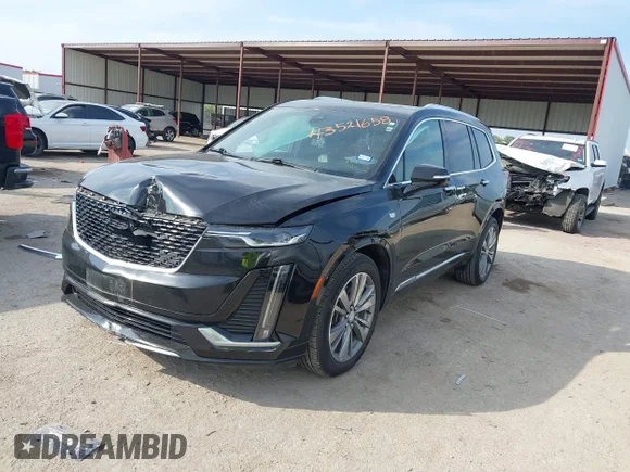 ✅ 2022 Cadillac XT6 Premium Luxury • VIN: 1GYKPCRS4NZ109424 • Лот: 43521658. Опубліковано раніше на IAAI з пробігом 86 880 миль. Безкоштовний доступ до архіву аукціонних продажів зі США та докладний звіт про історію автомобіля на DreamBid. Зображення 2.