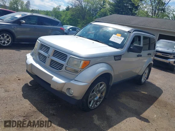 ✅ 2011 Dodge Nitro Heat • VIN: 1D4PU4GKXBW590907 • Лот: 42198828. Опубліковано раніше на IAAI з пробігом 171 988 миль. Безкоштовний доступ до архіву аукціонних продажів зі США та докладний звіт про історію автомобіля на DreamBid. Зображення 2.
