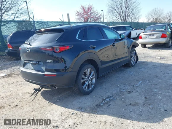 ✅ 2020 Mazda CX-30 Premium • VIN: 3MVDMBEM1LM128325 • Лот: 41933169. Опубликован ранее на IAAI с пробегом 33 876 миль. Бесплатный доступ к архиву аукционных продаж из США и подробный отчёт об истории автомобиля на DreamBid. Изображение 4.