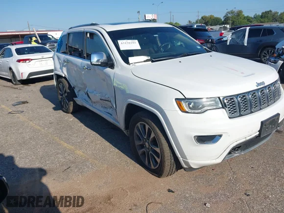 ✅ 2018 Jeep Grand Cherokee High Altitude • VIN: 1C4RJECG7JC141755 • Lot: 43158185. Listed on IAAI with 147,661 mi. Free auction sales archive from the USA and detailed vehicle history report at DreamBid. Image 1.