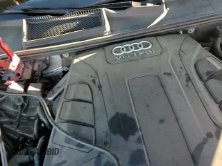 ✅ 2018 Audi Q7 Premium Plus • VIN: WA1LAAF72JD011221 • Lot: 87024785. Wystawiony na Copart z przebiegiem 105 835 mil. Bezpłatny archiwum sprzedaży aukcyjnych z USA i szczegółowy raport historii pojazdu na DreamBid. Zdjęcie 14.